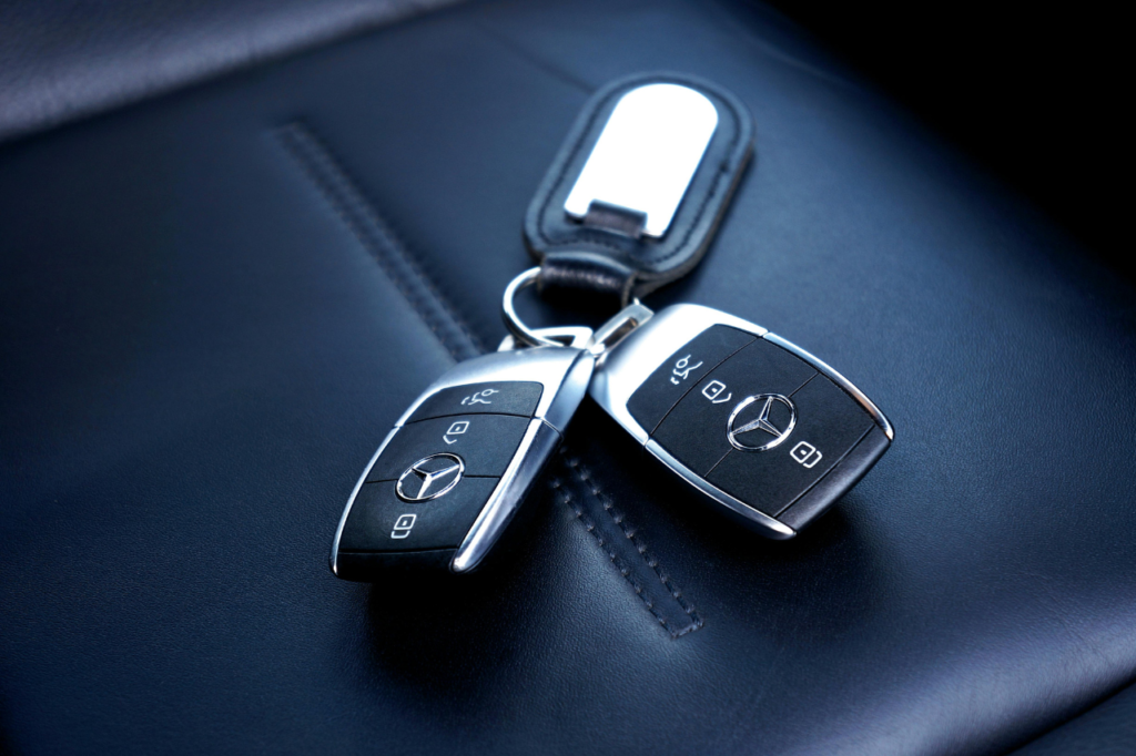 Car keys on a leather seat, symbolizing car rental options at Charles de Gaulle Airport (CDG) for travelers exploring France
